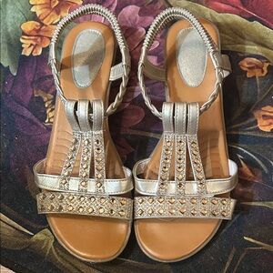 Super cute-Gold rhinestones and braided looped backs make these sandals a MUST!!